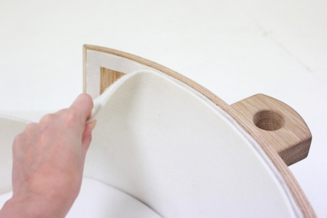 Lusi, la culla in legno a dondolo